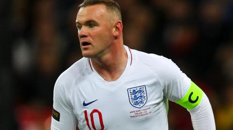 Wayne Rooney plays in his final game for England