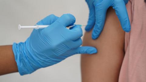 A Covid vaccine being administered