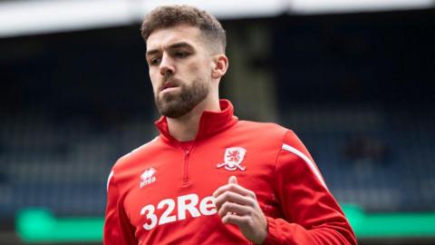 Middlesbrough defender Tommy Smith warming up before a game