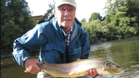 Stuart Smith holding a salmon