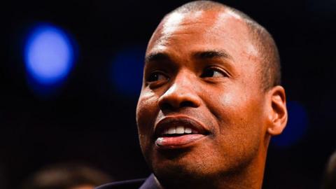 Jason Collins looks on in the first half during a game between the Brooklyn Nets and Milwaukee Bucks at the Barclays Center on November 19, 2014 in the Brooklyn borough of New York City.