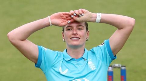 Lauren Bell looks frustrated while bowling for England