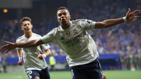 Kylian Mbappe celebrates