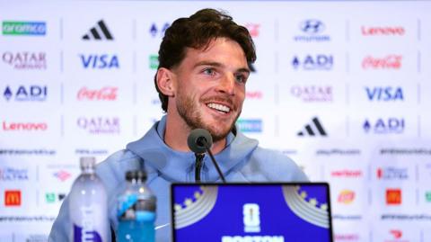 Declan Rice speak at a news conference. 