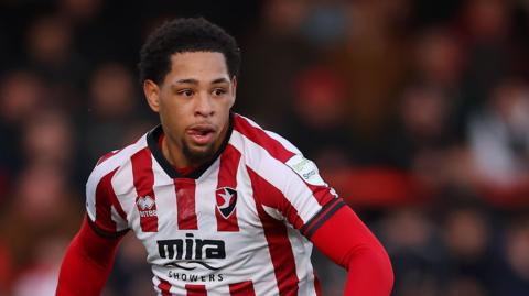Arkell Jude-Boyd in action for Cheltenham
