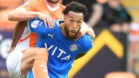 Stockport County's Kyle Wootton in action