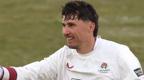 Paul Coughlin celebrates scoring century