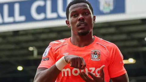 Ephron Mason-Clark celebrates scoring