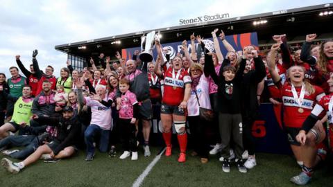 Gloucester–Hartpury celebrate winning Premiership Women's Rugby Trophy in 2025 