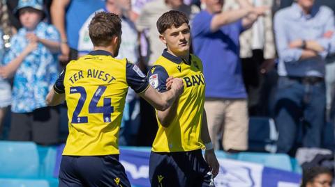 Will Lankshear (R) of Oxford United celebrates scoring his sides first goal during the Sky Bet Championship match between Oxford United and Sheffield Wednesday at Kassam Stadium 