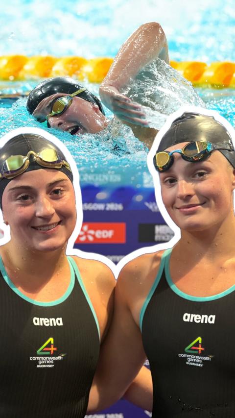 Two ladies in black swimming caps and swimming costumes smiling at the camera with an image of a woman swimming behind them