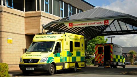 Two ambulances parked outside the A&E department at Royal Lancaster Infirmary