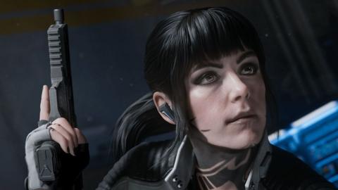 A screenshot shows a lifelike female character holding a gun in one hand as she stares at something off screen 