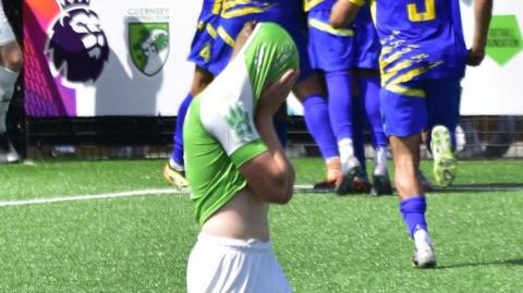 Dejected Guernsey FC player