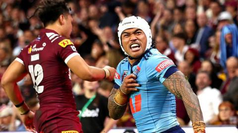 New South Wales' Brian To'o celebrate a try against Queensland