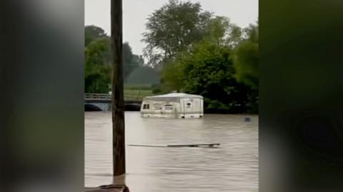 A motorhome in high waters.