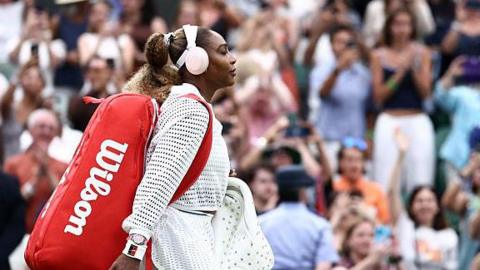Serena Williams walks out on Centre Court