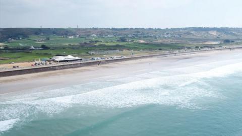 A drone image of the Watersplash, overlooking St Ouen's Bay