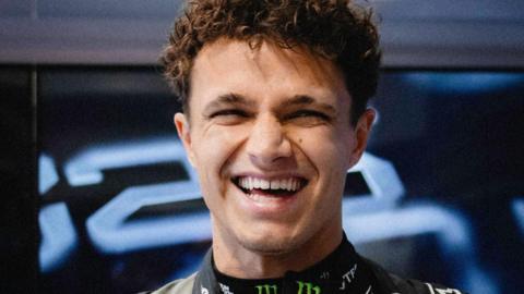 A smiling Lando Norris