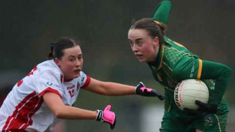 Meath's Aoibhín Cleary attempts to get away from Tyrone's Ella McNamee at Newtownstewart