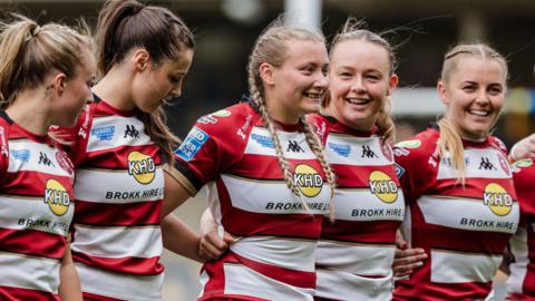 Wigan Warriors' women's team line up against Leeds Rhinos at Headingley