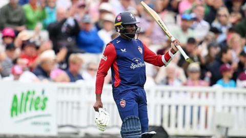 Kent's Daniel Bell-Drummond salutes the crowd after scoring a century against Somerset in the T20 Blast