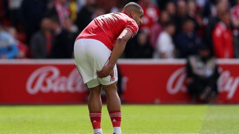 Murillo clutches his hamstring