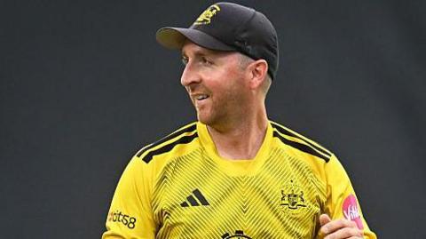Tom Smith after completing his final over as a professional cricketer for Gloucestershire during the Vitality Blast match between Somerset and Gloucestershire at The Cooper Associates County Ground in Taunton, England, on July 18, 2025