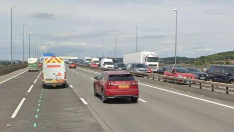 Traffic driving along the M5 Avonmouth Bridge