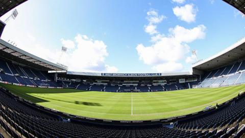 West Bromwich Albion's Hawthorns home with blue sky above.