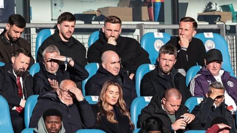Michael Carrick sitting next to Manchester United chief executive Omar Berrada during the FA Youth Cup final defeat at Manchester City