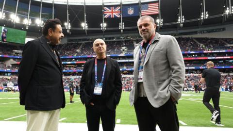 Shahid Khan, Daniel Levy and Ange Postecoglou