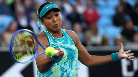 Iga Swiatek hits a forehand