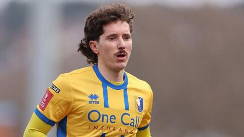 Aaron Lewis in action for Mansfield Town