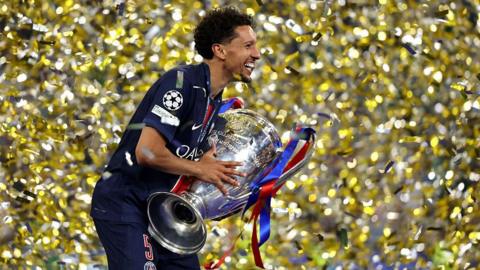 Marquinhos with the Champions League trophy