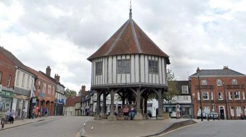 Market Cross, Wymondham is a timber-framed structure - an octagonal building supported over an open ground floor by eight timber buttress-like posts and a middle post 