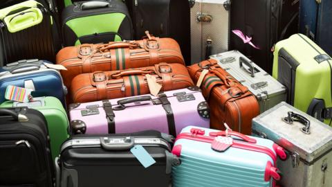 Cluster of suitcases at an airport