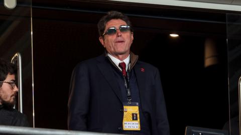 Southampton owner Dragan Solak looks on 