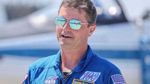 Artemis II Commander NASA Reid Wiseman looks on after the Artemis II crew arrived at the Launch and Landing Facility at NASA's Kennedy Space Center in Titusville, Florida, USA, 27 March 2026.