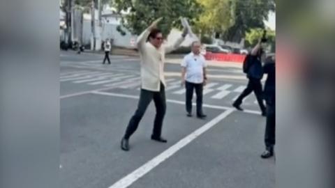 Philippine President Ferdinand Marcos Jr. performs a star jump.