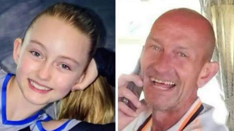 Esme Baker (L) wearing a top with a blue trim and her blonde hair in a ponytail, smiling at the camera. Lee Baker (R) is smiling at the camera with his mouth open and is wearing a top with an orange and brown collar. He is holding a phone to his right ear.