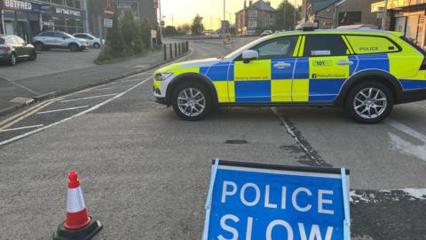 Police car at scene of crash in Clarkston