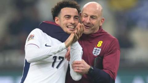 England interim manager Lee Carsley celebrates with debutant goalscorer Curtis Jones after the win in Greece