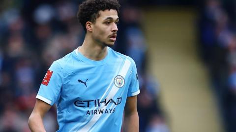 Max Alleyne in action for Manchester City