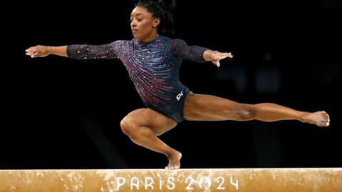 Simone Biles on the balance beam