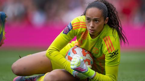 Phallon Tullis-Joyce holds onto the ball