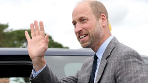 Prince William waves to the crowds at the Royal Cornwall Show