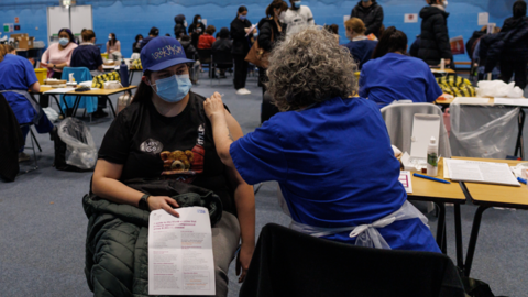 A student is given a MenB jab in a sports hall in Kent in March 2026.