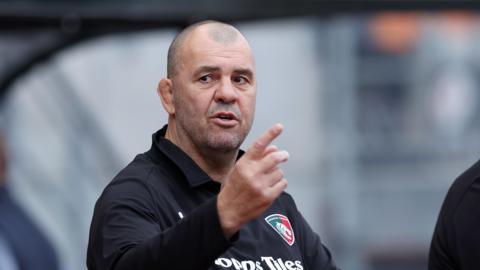 Leicester Tigers head coach Michael Cheika points while he talks on the touchline