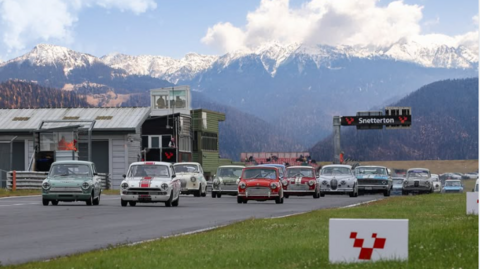 Images of cars on a race circuit with the sign Snetterton above the track, with a range of snow-capped mountains in the background. 